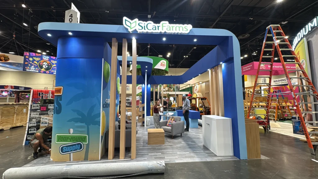 Setting up the SiCar Farms booth at IFPA 2026